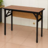 Rectangular IBM training table with long foldable MDF modesty panel fully covering the metal frame, shown in a professional setting