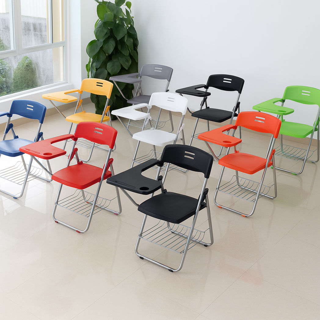 Folding student chairs in multiple colors with writing tablets and under-seat book racks in a classroom setting