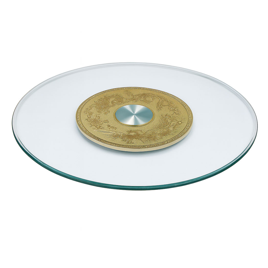 Round glass Lazy Susan turntable with carved gold base and smooth bearing, perfect for banquet or restaurant tables