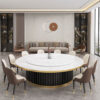 Luxury electric round dining table with white marble top, gold trim, and rotating lazy susan in a modern banquet and hotel dining room setting.