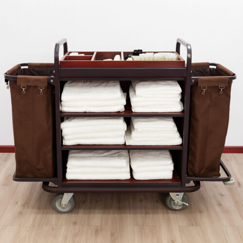 Professional hotel housekeeping cart with shelves, side bags, and wheels – front view