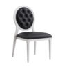 Elegant Louis-style hotel dining chair with white wooden frame, black upholstered seat, and button-tufted backrest