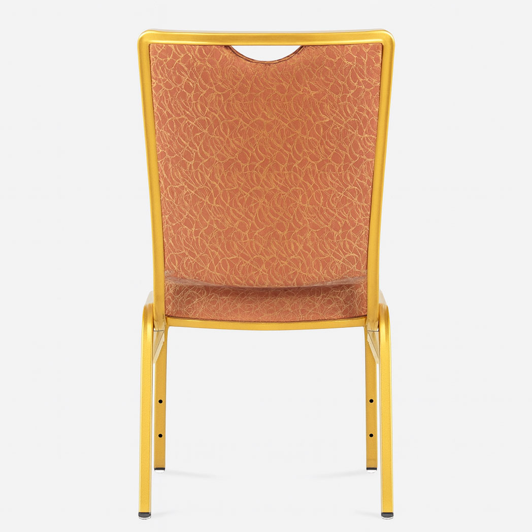 Back view of red upholstered banquet chair with patterned fabric and sturdy gold steel frame.