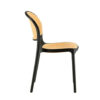 Side view of modern rattan event chair with black PP frame and woven rattan seat and backrest