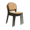 Stacked plastic rattan event chairs showing high stacking capacity for rentals and storage