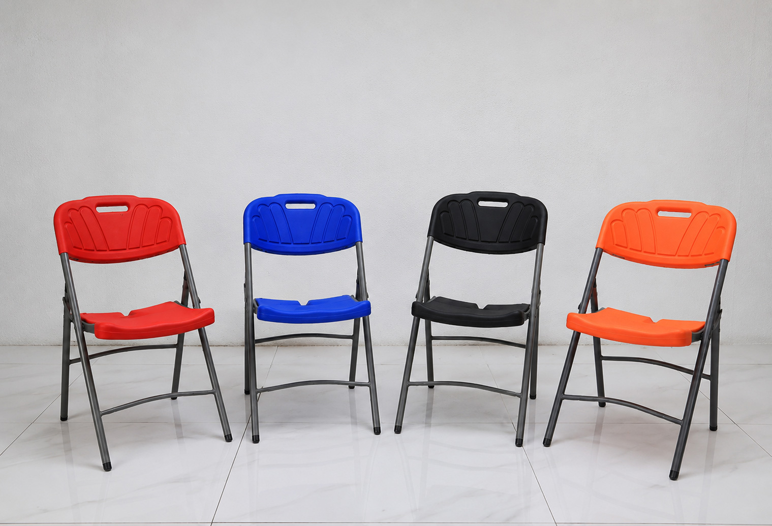 Aurora folding plastic banquet chairs in multiple colors including red, blue, black, and orange, commercial event seating
