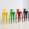 Industrial low-back Tolix stools in multiple colors with metal seat options, available in 45cm, 60cm, 65cm and 76cm heights for restaurant, cafe, bar and hotel commercial seating.