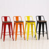 Industrial low-back Tolix stools with wood seats in red, orange, yellow and black powder-coated metal finishes for restaurant, cafe, bar and hotel commercial seating.