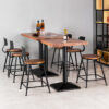 Commercial restaurant bar table set with wood grain tabletops and black metal stools for cafés, bistros, restaurants, bars and hospitality dining spaces