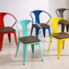 Color collection of Industrial Tolix armchairs with walnut wood seats and powder-coated metal frames for commercial dining spaces