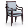 Heritage Aluminum Arm Dining Chairs stacked together, featuring a dark wood grain aluminum frame and upholstered seat and back for senior living, healthcare, hospitality, and commercial dining environments.